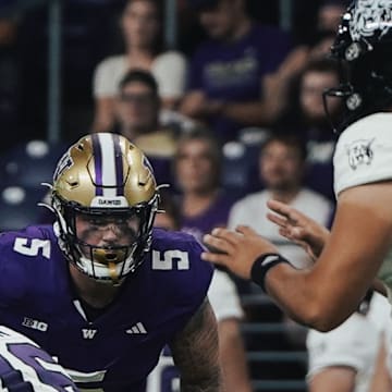 Zach Durfee stares down Weber State QB Richie Munoz. 