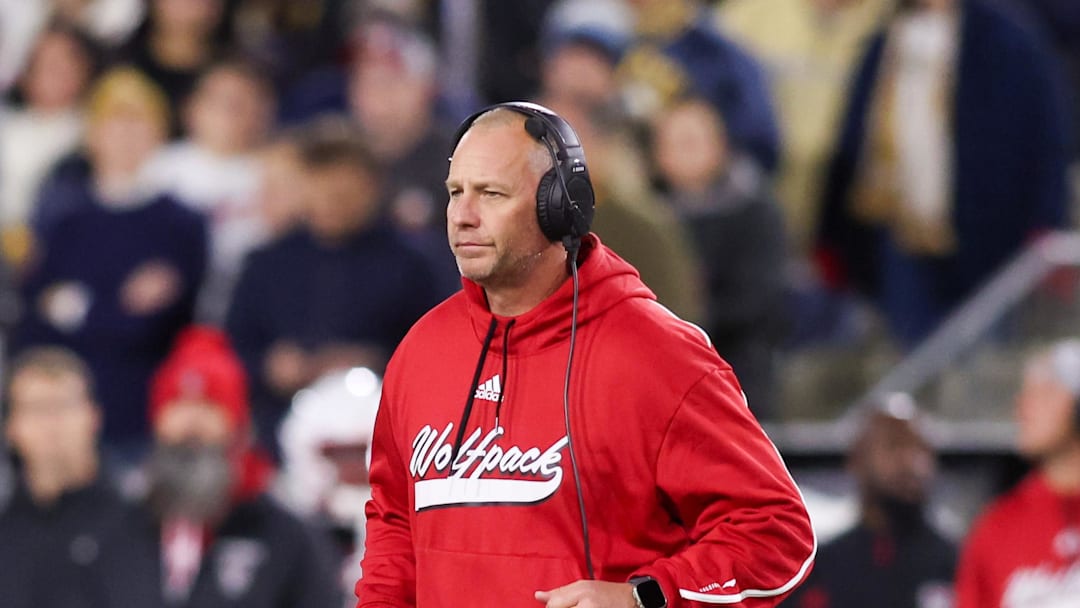 Nov 21, 2024; Atlanta, Georgia, USA; North Carolina State Wolfpack head coach Dave Doeren on the field against the Georgia Tech Yellow Jackets in the second quarter at Bobby Dodd Stadium at Hyundai Field. Mandatory Credit: Brett Davis-Imagn Images