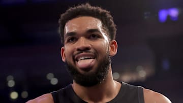 New York Knicks center Karl-Anthony Towns celebrates his three point shot against the Miami Heat.