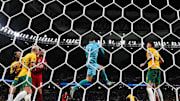 TOPSHOT-FBL-WC-2022-MATCH37-AUS-DEN