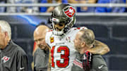 Oct 20, 2025; Detroit, Michigan, USA; Tampa Bay Buccaneers wide receiver Mike Evans (13) is helped off the field after an injury against the Detroit Lions during the first half at Ford Field. 