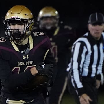 Iona Prep's Rocco Presto (13) pulls in a reception during the New York Catholic High School Football League AAA championship game against Cardinal Hayes at Fordham University in The Bronx on Saturday, November 2023. Cardinal Hayes won 30-29.