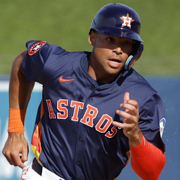 Feb 22, 2025; West Palm Beach, Florida, USA; Houston Astros infielder Cam Smith rounds second base in the ninth inning against the Washington Nationals at CACTI Park of the Palm Beaches.
