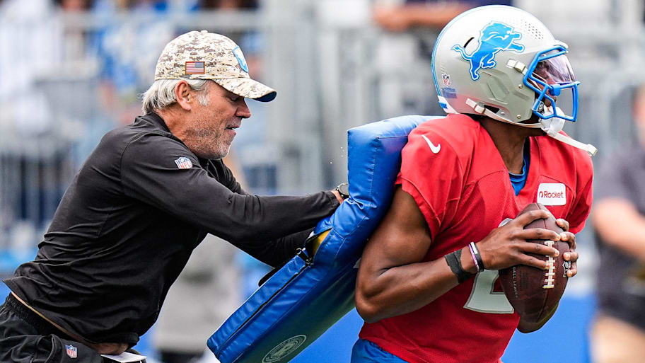 Detroit Lions quarterback Hendon Hooker (2) practices with quarterbacks coach Mark Brunell  | Junfu Han / USA TODAY NETWORK via Imagn Images