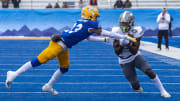 Dec 20, 2022; Boise, Idaho, USA; Eastern Michigan Eagles wide out Darius Lassiter (9) make reception as San Jose State Spartans cornerback Nehemiah Shelton (23) defends during the first half of action of the Famous Idaho Potato Bowl at Albertsons Stadium. Mandatory Credit: Brian Losness-USA TODAY Sports
