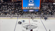 The Penn State men's hockey team celebrates a 3-2 victory over UConn in the Allentown regional final of the NCAA Men's Hockey Tournament.