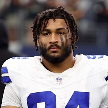 Dallas Cowboys defensive end Marshawn Kneeland walks off the field after the game against the New Orleans Saints 