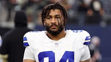 Sep 15, 2024; Arlington, Texas, USA;  Dallas Cowboys defensive end Marshawn Kneeland (94) walks off the field after the game against the New Orleans Saints at AT&T Stadium. Mandatory Credit: Tim Heitman-Imagn Images