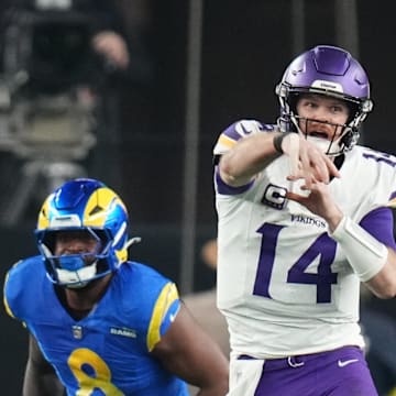 Minnesota Vikings quarterback Sam Darnold (14) throws the ball against the Los Angeles Rams during their playoff game at State Farm Stadium on Jan. 13, 2025, in Glendale.