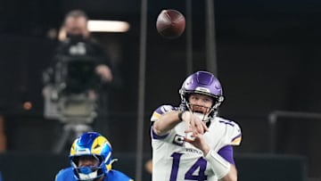 Minnesota Vikings quarterback Sam Darnold (14) throws the ball against the Los Angeles Rams during their playoff game at State Farm Stadium on Jan. 13, 2025, in Glendale.