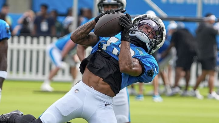 Jul 30, 2024; Charlotte, NC, USA; Carolina Panthers wide receiver Deven Thompkins (12) makes a catch during training camp at Carolina Panthers Practice Fields. Mandatory Credit: Jim Dedmon-USA TODAY Sports