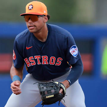 Feb 27, 2025; Port St. Lucie, Florida, USA; Houston Astros third baseman Cam Smith (90) plays his position against the New York Mets during the second inning at Clover Park