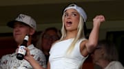 Former LSU gymnast Olivia Dunne cheers during the second inning between the New York Mets and the Pittsburgh Pirates at Citi Field.