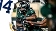 Michigan State's Brandon Tullis runs the ball against Michigan during the third quarter on Saturday, Oct. 25, 2025, at Spartan Stadium in East Lansing.