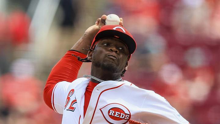 Cincinnati Reds relief pitcher Luis Mey (62) pitches