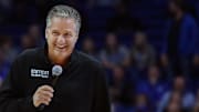 Kentucky's coach John Calipari is all smiles as he tells the crowd the may see some zone play during the Blue-White scrimmage at Rupp Arena on Oct. 18, 2109
