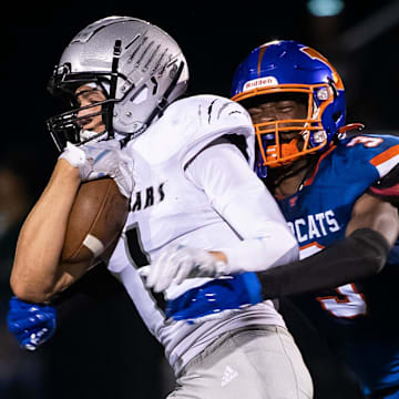 Elias Coke attempts to avoid a defender last season. He is one of the wide receivers to keep an eye out for this fall.