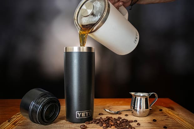 The YETI Travel Bottle being filled by the YETI French Press.