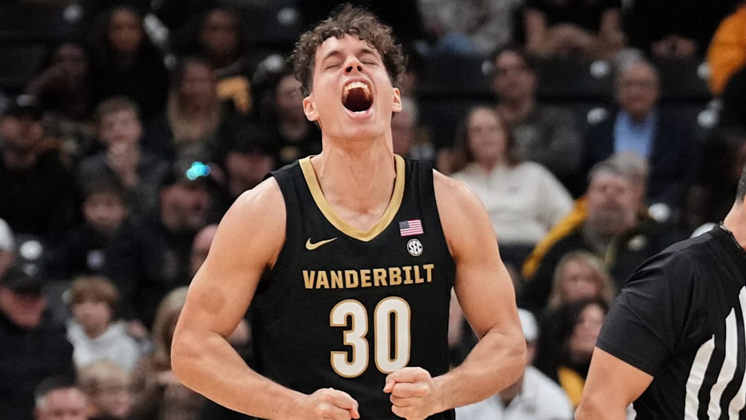 Jan 11, 2025; Columbia, Missouri, USA; Vanderbilt Commodores guard Chris Manon (30) celebrates after scoring against the Missouri Tigers during the second half at Mizzou Arena.