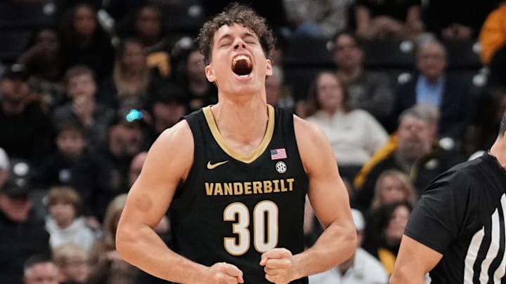 Jan 11, 2025; Columbia, Missouri, USA; Vanderbilt Commodores guard Chris Manon (30) celebrates after scoring against the Missouri Tigers during the second half at Mizzou Arena. Jan 11, 2025; Columbia, Missouri, USA; Vanderbilt Commodores guard Chris Manon (30) celebrates after scoring against the Missouri Tigers during the second half at Mizzou Arena.