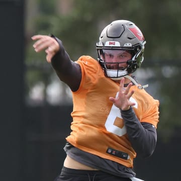 Jul 25, 2024; Tampa, FL, USA;  Tampa Bay Buccaneers quarterback Baker Mayfield (6) throws the ball during training camp at AdventHealth Training Center. Mandatory Credit: Kim Klement Neitzel-USA TODAY Sports