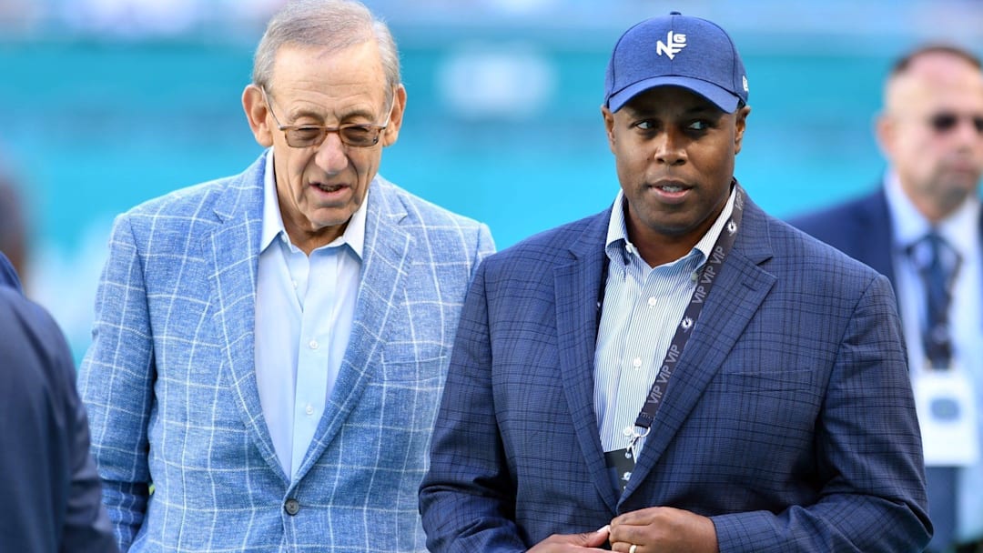 Dolphins owner Stephen Ross (left) talks with general manager Chris Grier before a game in November 2022. Dolphins owner Stephen Ross (left) talks with general manager Chris Grier before a game in November 2022.