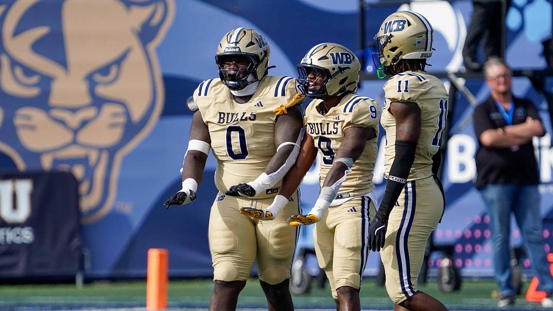 West Boca defenders Jamar Thompson (0), Grant Edmond (9), and Demetrius Geathers Jr. (11) celebrate a sack against West Broward in the second quarter of the 6A State Final at Pitbull Stadium on Dec. 12, 2025, in Miami, FL.
