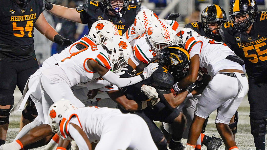 American Heritage and Jones face off in first-half action of the FHSAA Class 4A football championship on Friday, Dec. 13, 2024, in Miami. Jeff Romance/Special to the USA Today Florida Network