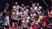 Members of the Husker Volleyball team enter the arena during pregame introductions.