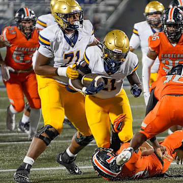 Nationally ranked St. Thomas Aquinas defeated Lakeland, 34-0, in last year's Class 5A state title game. The schools face off again for the 5A championship on Thursday, Dec. 11, at FIU's Pitbull Stadium in Miami.