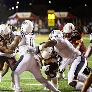 The ULM Warhawks opened their 2024 season on a rainy Thursday night in Malone Stadium. Bryant Vincent secured his first win as the new head coach of the Warhawks as they defeated the Jackson State Tigers , 30-14.