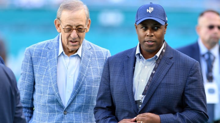 Miami Dolphins owner Stephen Ross (left) talks with general manager Chris Grier before a game in November 2022.