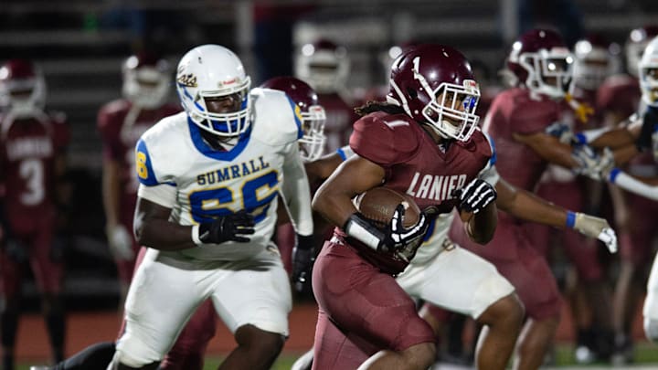 Lanier's Jeremiah Wilson (1) carries against Sumrall during the MHSAA 4A first-round playoffs at Hughes Field in Jackson Miss., Friday, Nov. 8, 2024.