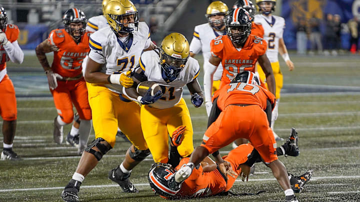 Nationally ranked St. Thomas Aquinas defeated Lakeland, 34-0, in last year's Class 5A state title game. The schools face off again for the 5A championship on Thursday, Dec. 11, at FIU's Pitbull Stadium in Miami. Nationally ranked St. Thomas Aquinas defeated Lakeland, 34-0, in last year's Class 5A state title game. The schools face off again for the 5A championship on Thursday, Dec. 11, at FIU's Pitbull Stadium in Miami.