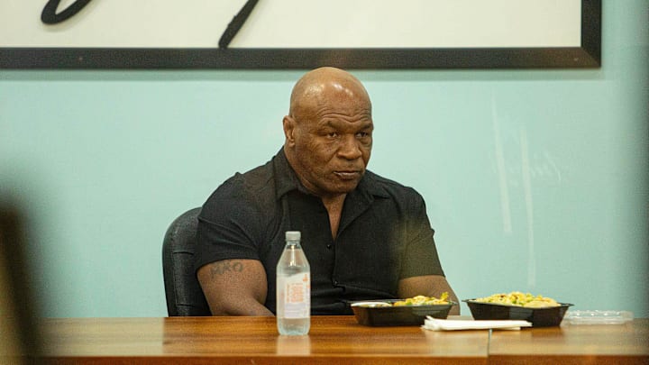 Mike Tyson takes a break from signing autographs to enjoy the Wellington Green Mall cuisine January 25, 2025 in Wellington.