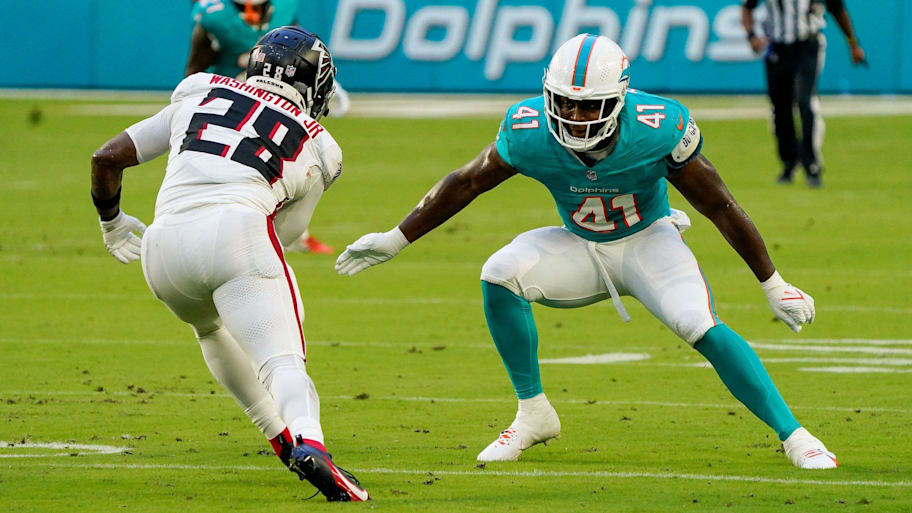 Miami Dolphins linebacker Channing Tindall (41) makes a tackle in the first quarter during a preseason game at Hard Rock Stadium in 2023. | JEFF ROMANCE/THE PALM BEACH POST / USA TODAY NETWORK