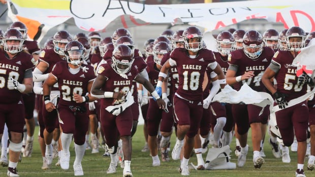 The Niceville Eagles take the field before the start of their season opener against South Sumter at Niceville.