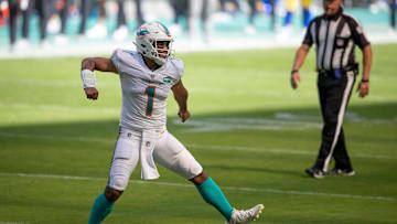 Miami Dolphins quarterback Tua Tagovailoa (1) celebrates his first touchdown pass to Miami Dolphins wide receiver DeVante Parker (11) at Hard Rock Stadium in Miami Gardens, November 1, 2020. (ALLEN EYESTONE / THE PALM BEACH POST)