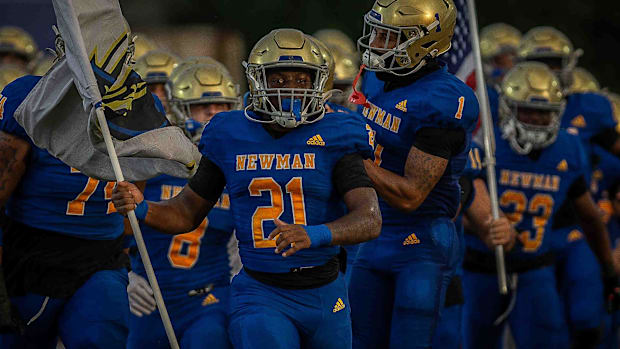 The Cardinal Newman Crusaders hosted the Pahokee High School Blue Devils