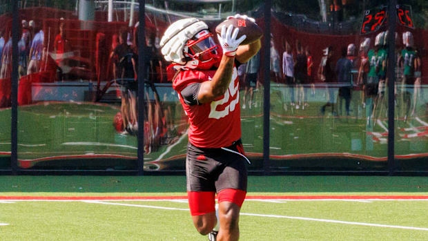 Nebraska running back Kenneth Williams catches a pass during a drill at practice Monday morning.