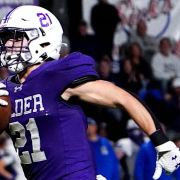 Elder Panthers running back runs the ball to the end zone for a touchdown in the first half of a high school football game between the Elder Panthers and Highlands Bluebirds, Friday, Oct. 10, 2025, at The Pit in Cincinnati.