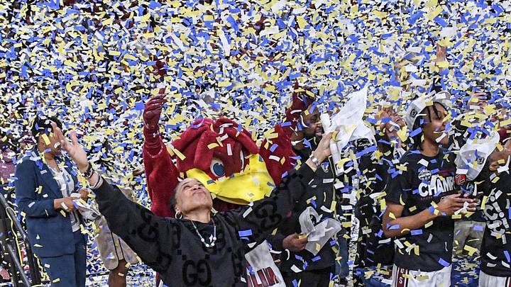 South Carolina Coach Dawn Staley celebrates with the team after the SEC Women's Basketball Tournament Championship at the Bon Secours Wellness Arena in Greenville, SC on Sunday, March 10, 2024.