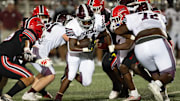 Picayune's Jeremiah Contee (44) finds a hole during play against the Bulldogs in Brandon, Miss., Friday, Aug. 25, 2023.