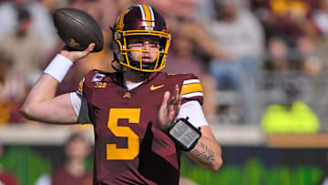 Sep 27, 2025; Minneapolis, Minnesota, USA;  Minnesota Golden Gophers quarterback Drake Lindsey (5) makes a pass against Rutgers Scarlet Knights during the first quarter at Huntington Bank Stadium.