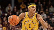 Jan 25, 2025; Minneapolis, Minnesota, USA; Minnesota Golden Gophers guard Isaac Asuma (1) brings the ball up court against the Oregon Ducks during the first half at Williams Arena. Mandatory Credit: Nick Wosika-Imagn Images
