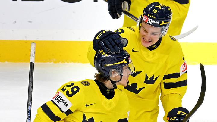 Sweden players William Hakansson and Casper Juustovaara at the 2026 IIHF World Junior Championship ice hockey tournament.