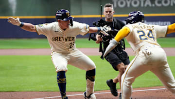 Andrew Vaughn (28) celebrates his home run with teammate William Contreras 