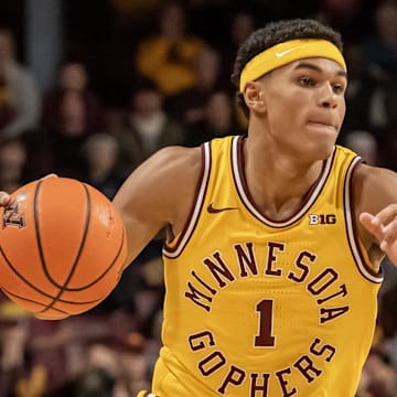 Jan 25, 2025; Minneapolis, Minnesota, USA; Minnesota Golden Gophers guard Isaac Asuma (1) brings the ball up court against the Oregon Ducks during the first half at Williams Arena. Mandatory Credit: Nick Wosika-Imagn Images