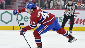 Mar 9, 2024; Montreal, Quebec, CAN; Montreal Canadiens forward Rafael Harvey-Pinard (49) plays the puck during the second period of the game against the Toronto Maple Leafs at the Bell Centre. Mandatory Credit: Eric Bolte-USA TODAY Sports