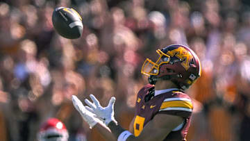 Sep 27, 2025; Minneapolis, Minnesota, USA;  Minnesota Golden Gophers wide receiver Jalen Smith (8) catches a pass for a 78-yard against Rutgers Scarlet Knights during the second quarter at Huntington Bank Stadium. Mandatory Credit: Nick Wosika-Imagn Images